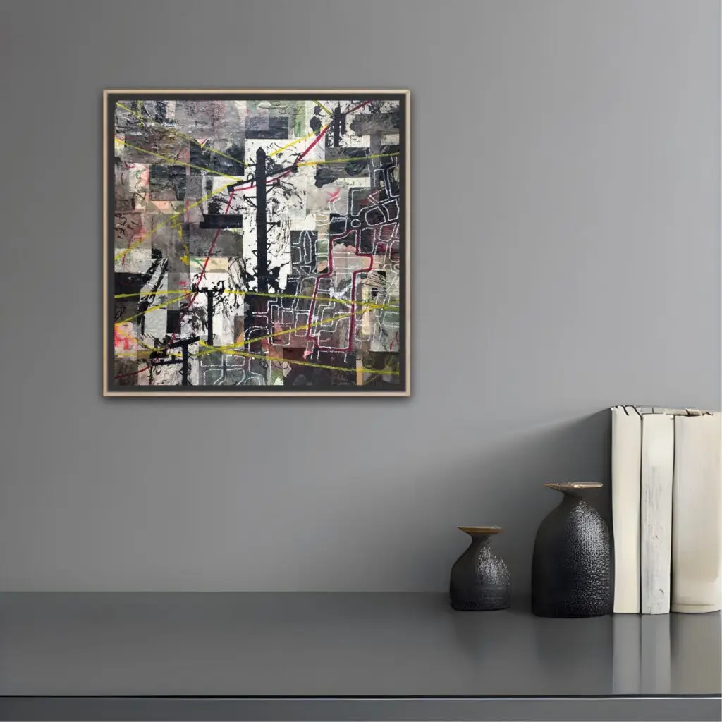Black and white collage showing a map of an imaginary Eruv and telegraph poles displayed on a grey wall above a shelf with books and vases