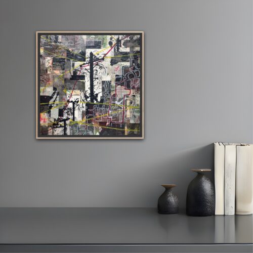 Black and white collage showing a map of an imaginary Eruv and telegraph poles displayed on a grey wall above a shelf with books and vases