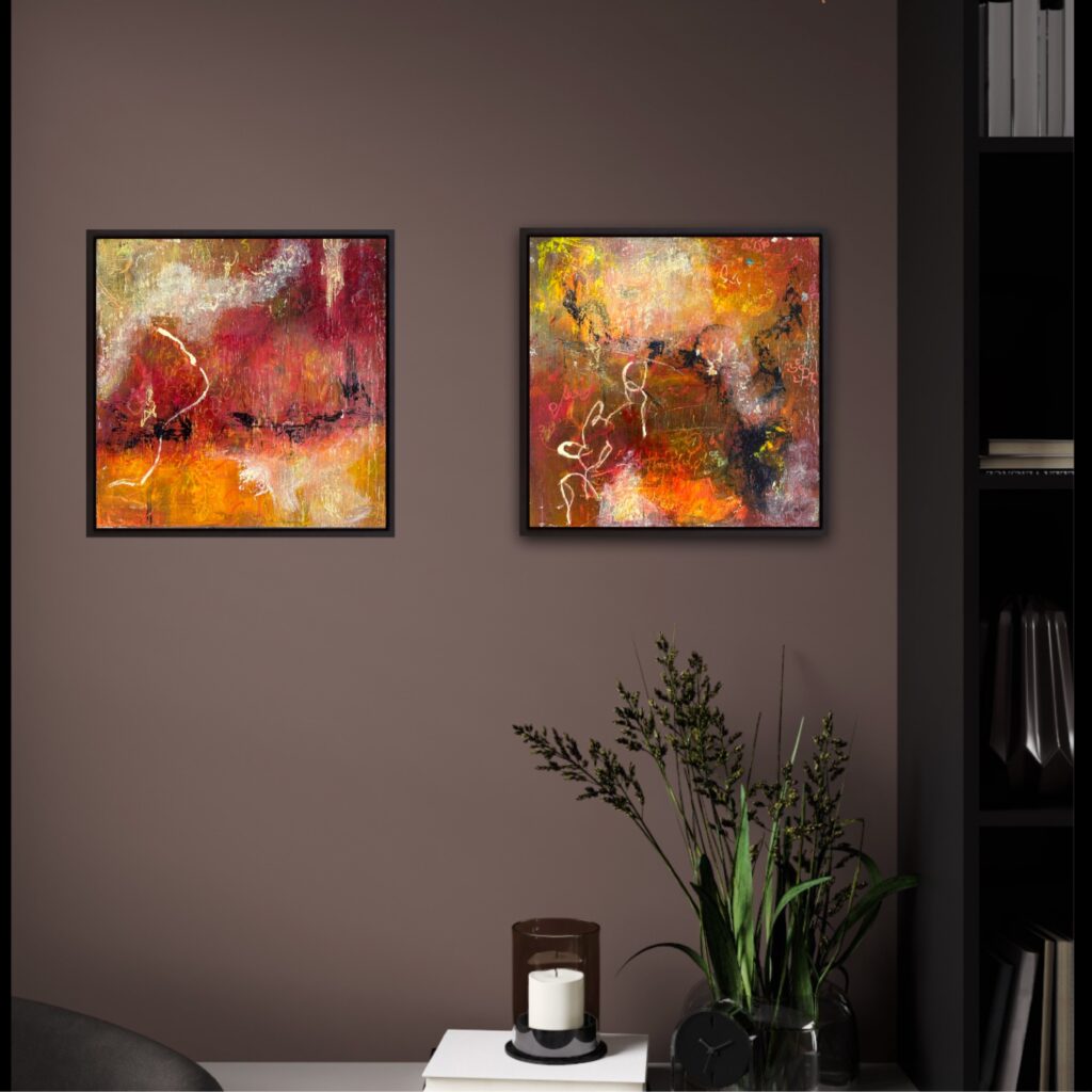 Two abstracts is orange brows, creams and blacks showing abstract bits of lightning and thunder displayed in a living room,