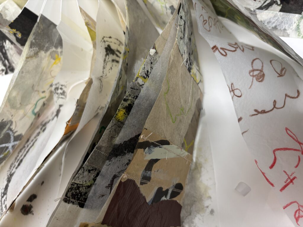 Artists book with graffiti like marks on pages